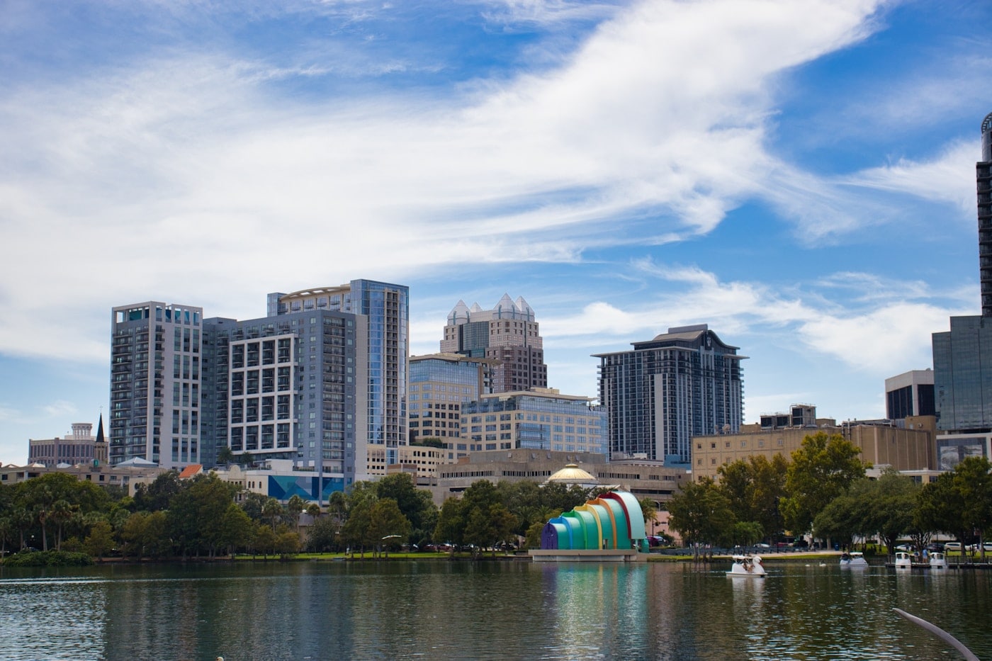 Downtown Orlando skyline reflected in Lake Eola by day