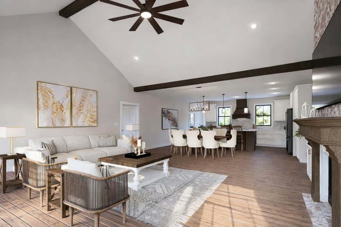 The Cypress — open great room with vaulted, beamed ceiling