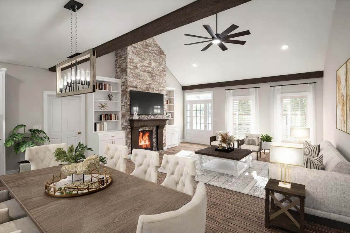 The Cypress — living area with stone fireplace and built-in shelving