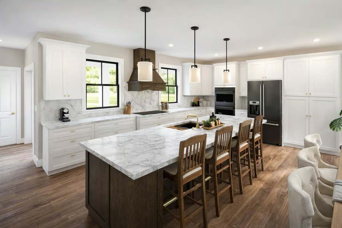 The Cypress — kitchen with island, range hood and windows