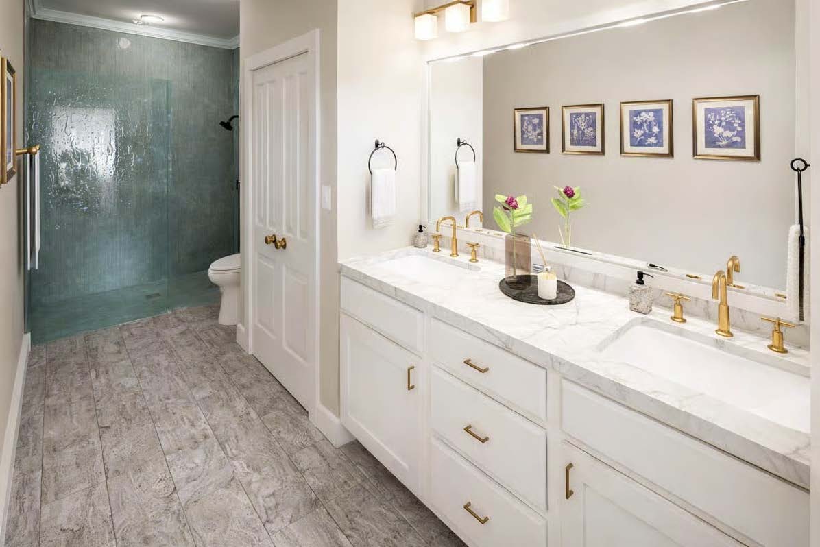 The Cypress — primary bathroom with dual vanity and glass shower