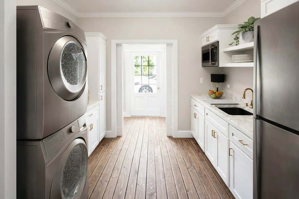 The Cypress — laundry area opening toward the kitchen
