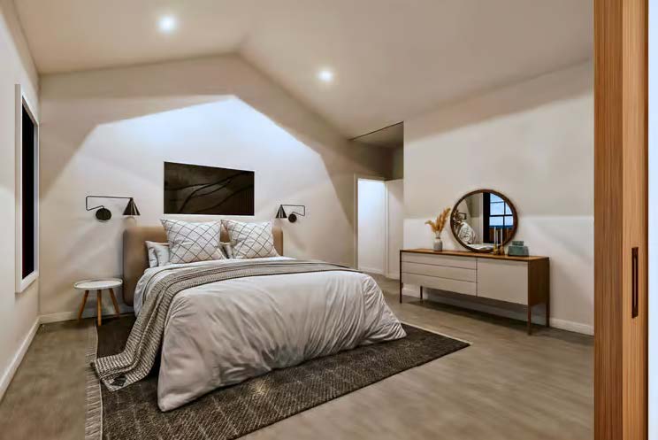 The Stallion — primary bedroom with vaulted ceiling