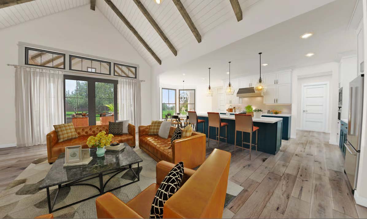 The Cedar Run — open-concept living room and kitchen with vaulted ceiling